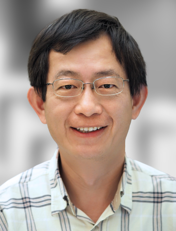 A portrait of Maw-Lin Kuo, a smiling man with glasses wearing a plaid shirt against a blurred background.